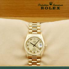 Ladies Rolex Datejust 68278 18 CT case with Champagne Myriad Pave dial