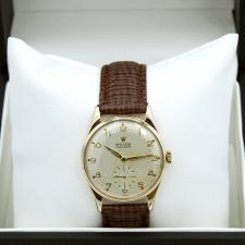 Gents Rolex Precision 12868 9 CT case with Silver dial