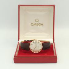 Gents Omega Geneve  18 CT case with Silver dial