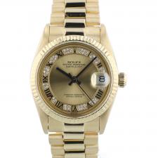 Ladies Rolex Datejust 68278 18 CT case with Champagne Myriad Pave dial